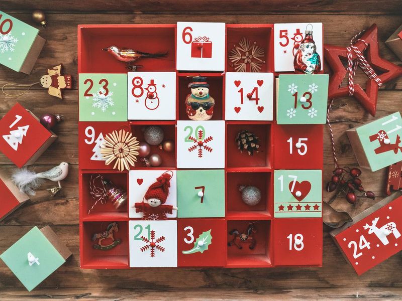 Old wooden advent calendar with vintage decoration