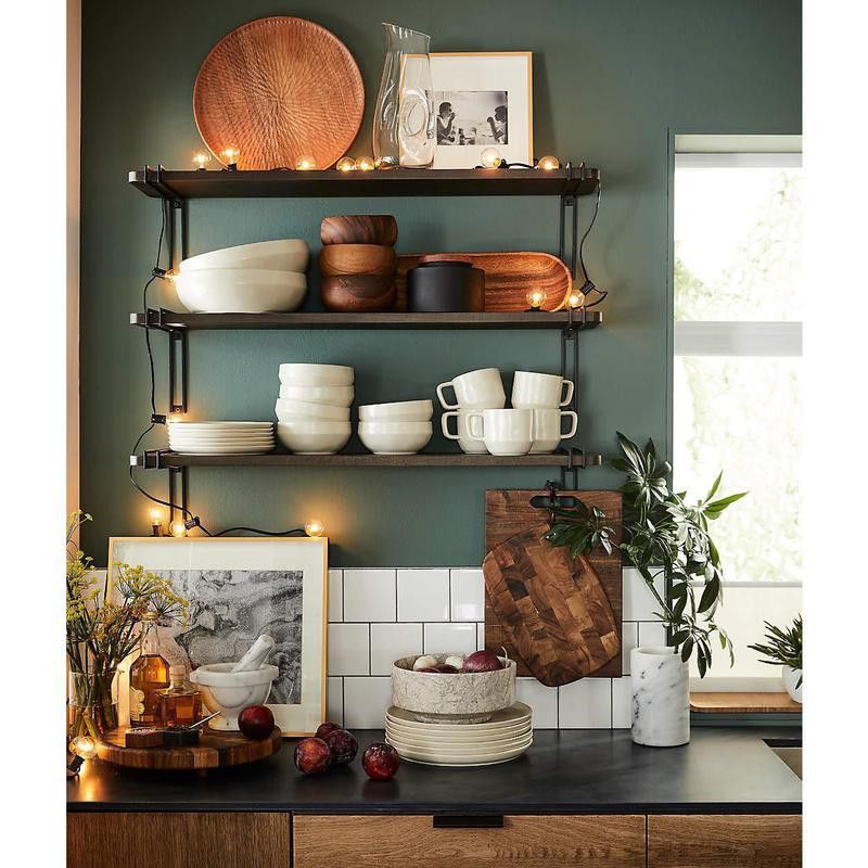 Open shelving in a kitchen with Christmas lights