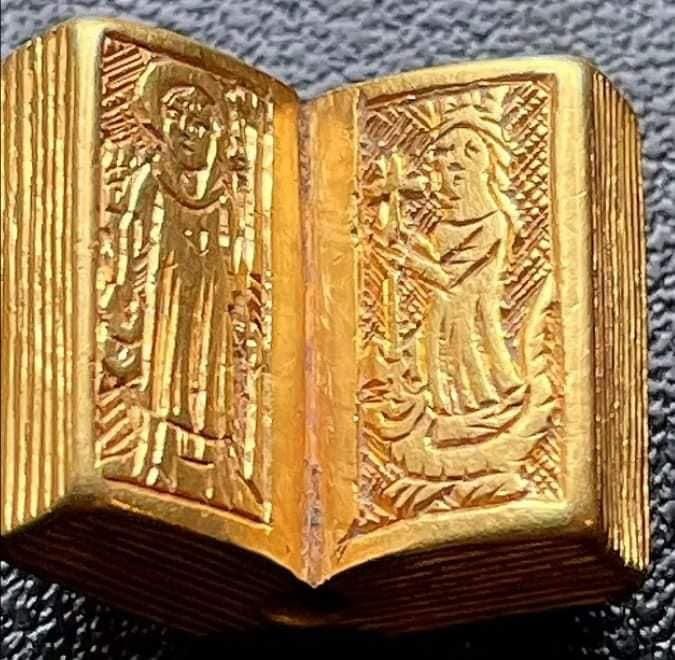 Ornate gold pendant