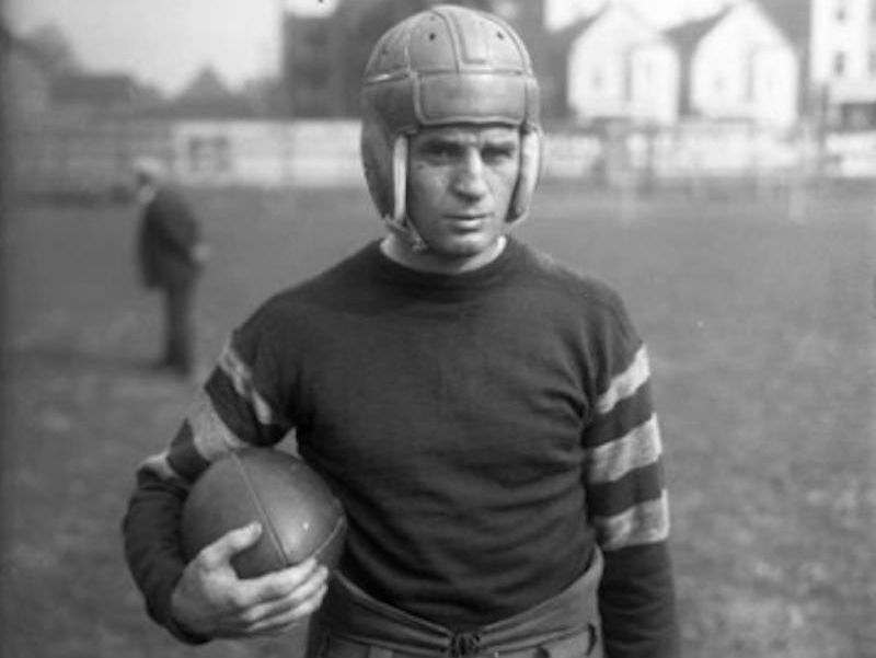 Paddy Driscoll holding ball