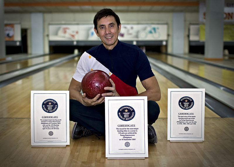 Paeng Nepomuceno with his Guinness Book of World Records certificates