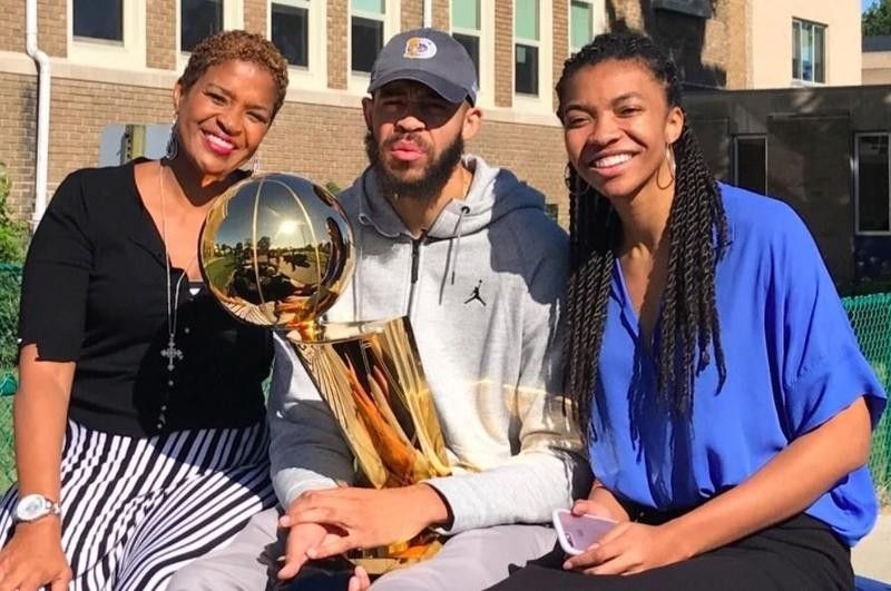 Pam poses with her son JaVale and daughter Imani