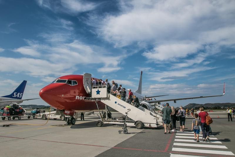 Passengers boarding an Norwegian airplane