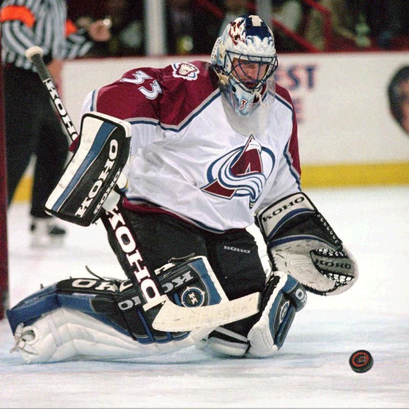 Patrick Roy makes a save against the Chicago Blackhawks