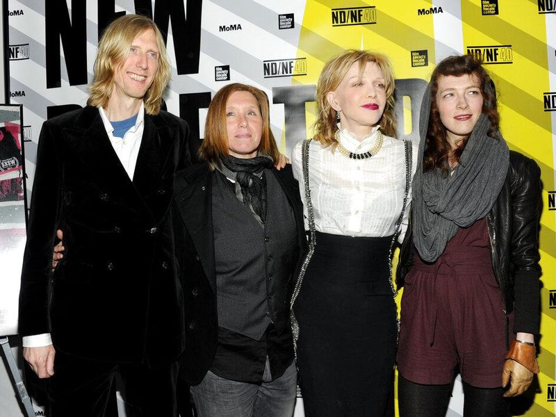 Patty Schemel with the members of Hole