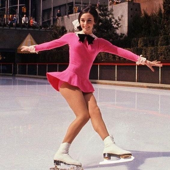 Peggy Fleming in pink figure skating dress