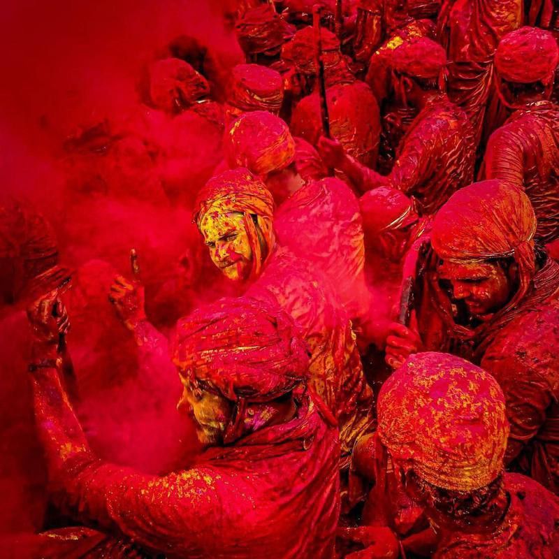 People covered in colors during Holi