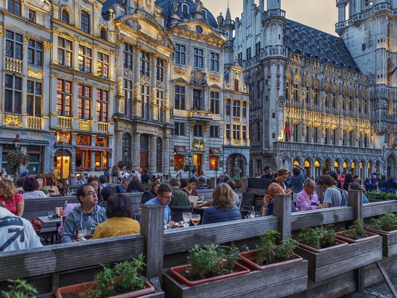 People in a Cafe in Grand Place Square in Brussels, Belgium