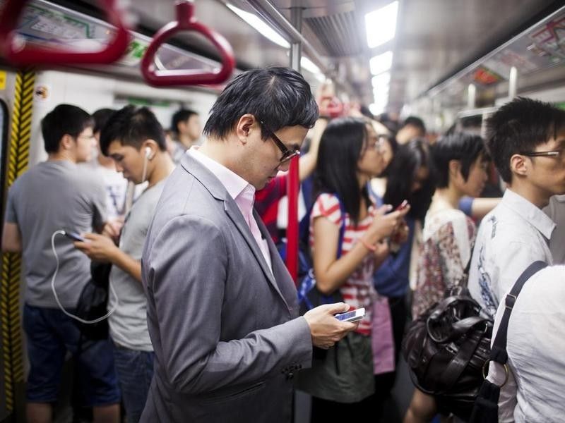 People in the metro in Hong Kong
