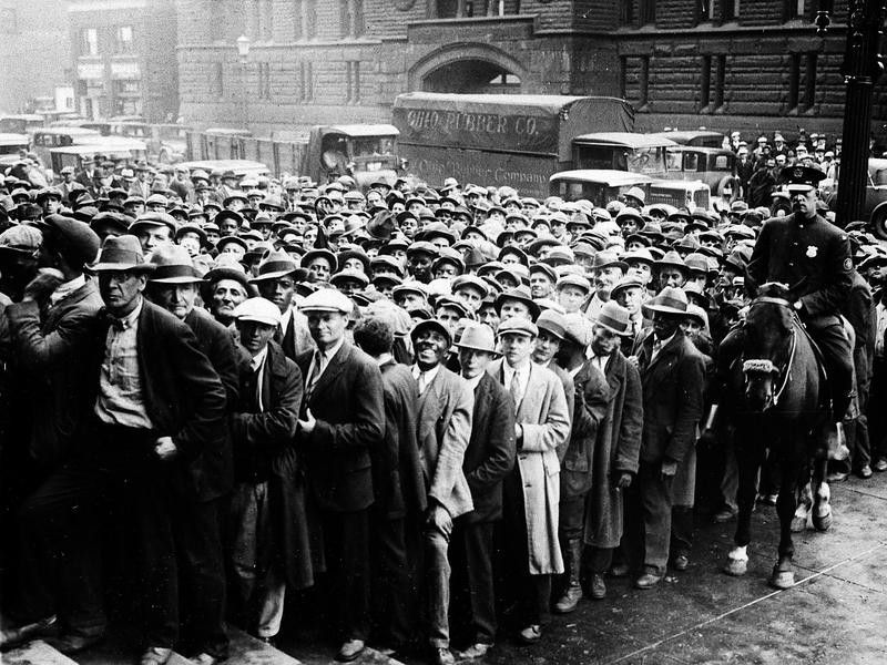 People lining up for jobs during the Great Depression