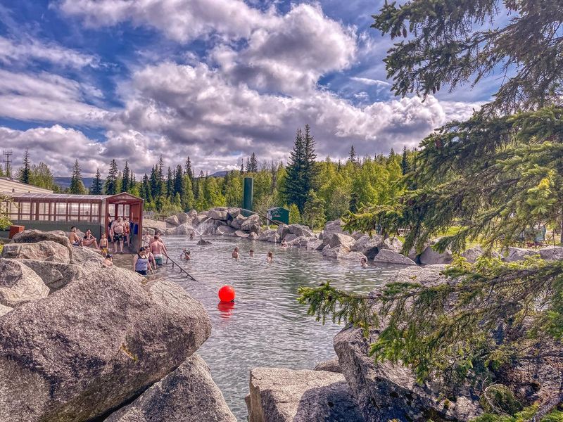 People relaxing in the Chena Hot Springs in Alaska