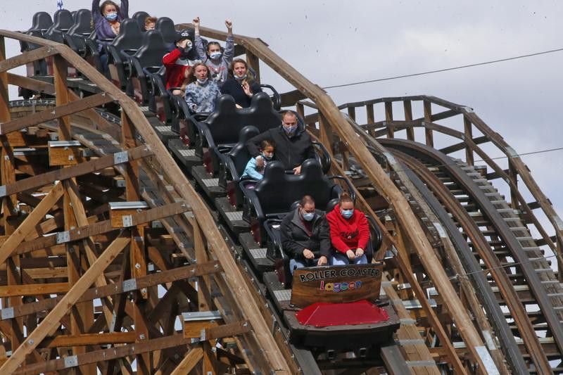 People ride the Roller Coaster