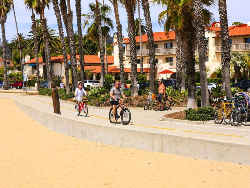 People riding their bicycles along the Santa Barbara bike trail