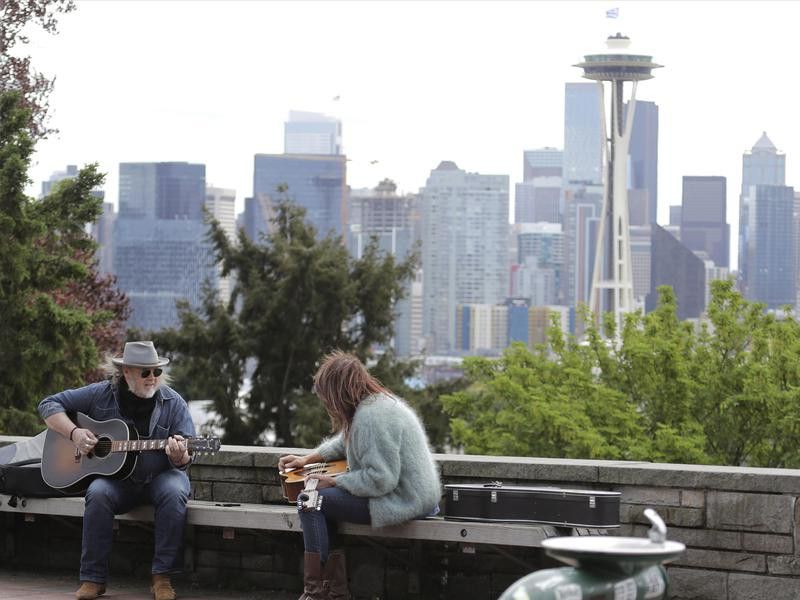 People sitting at Kerry Park