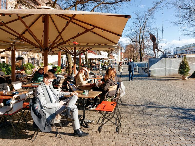 People sitting at restaurant outdoors in Ljubljana