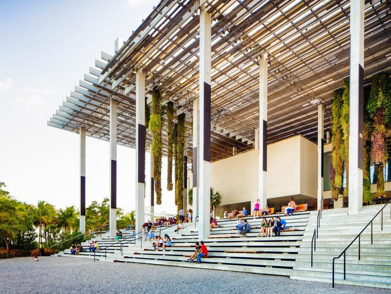 People sitting at the back of the PAMM Miami Perez art museum