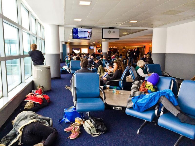 People sleeping on the floor at JFK Airport, New York