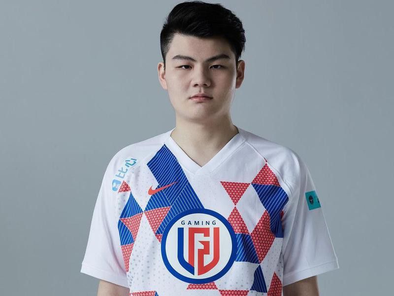 Person in LGD Gaming shirt