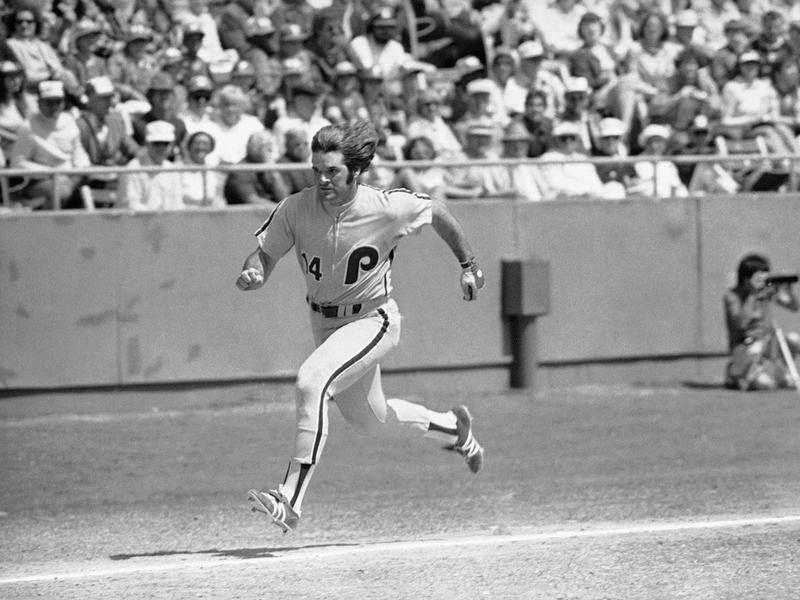 Pete Rose runs hard for home plate
