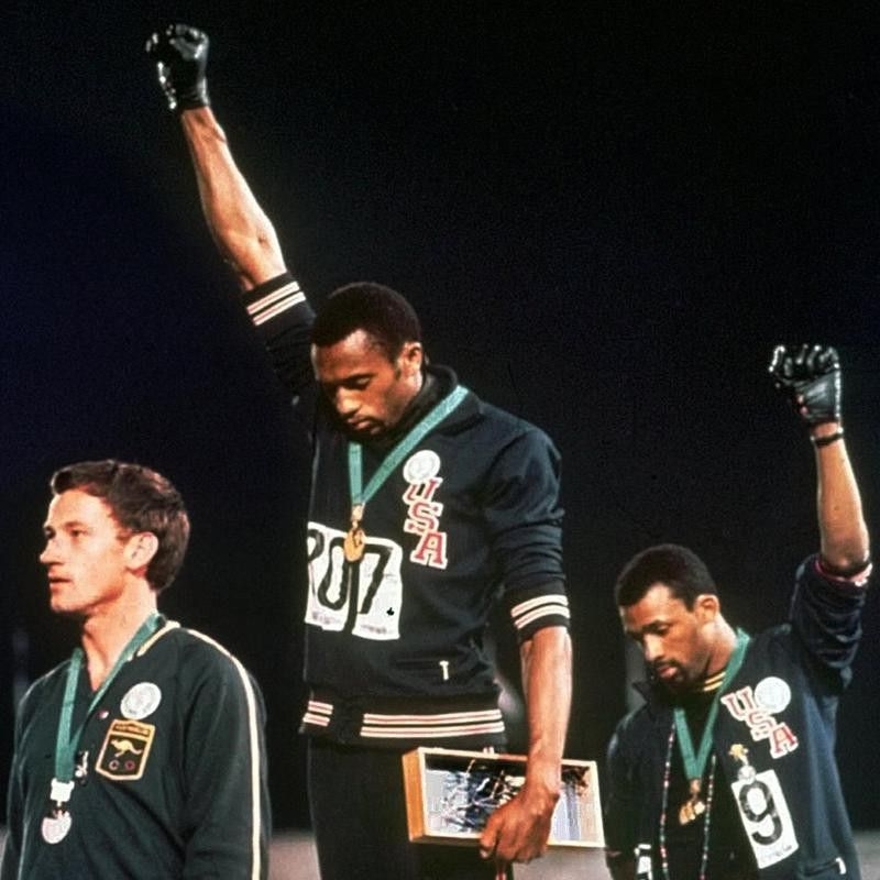 Peter Norman,Tommie Smith,John Carlos after receiving metals