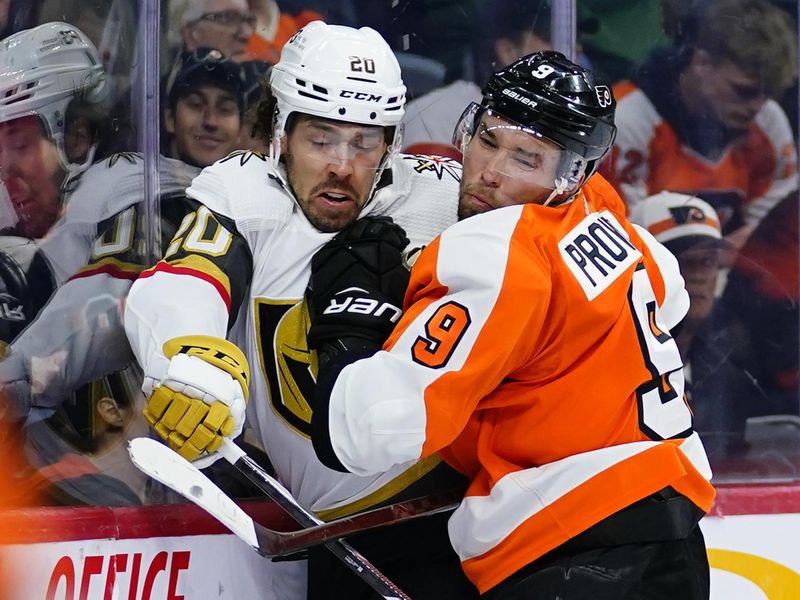 Philadelphia Flyers' Ivan Provorov and Vegas Golden Knights' Chandler Stephenson collide