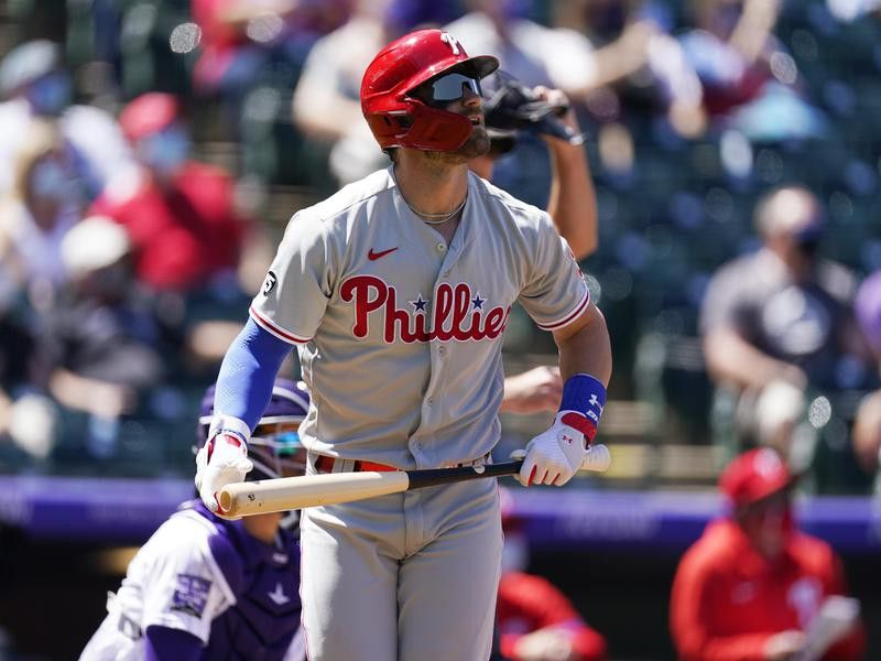 Philadelphia Phillies' Bryce Harper heads up first base line after hitting solo home run