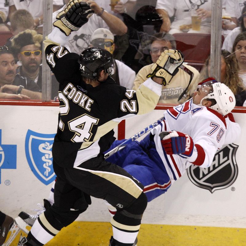 Pittsburgh Penguins' Matt Cooke collides with Montreal Canadiens' Andrei Markov