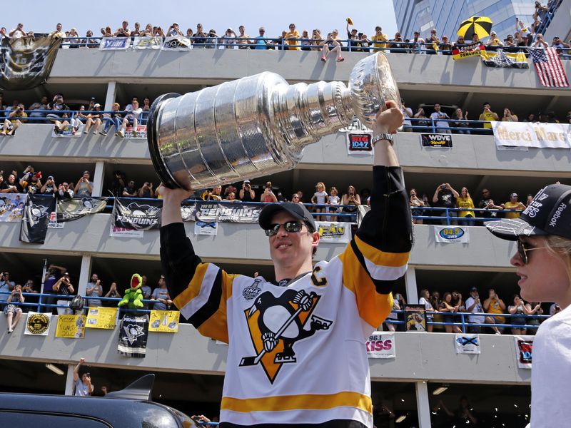 Pittsburgh Penguins' Sidney Crosby hoists Stanley Cup