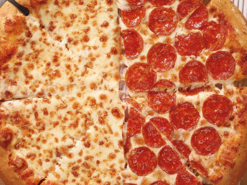 Pizza Hut half-cheese, half-pepperoni pizza