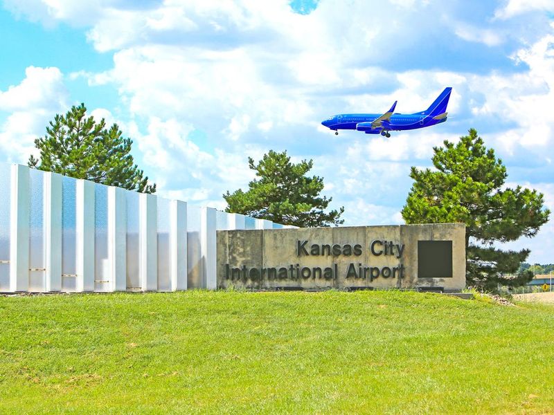 Plane flying over Kansas City International Airport