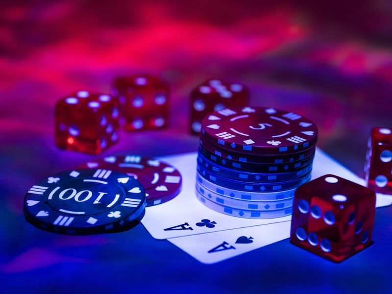 Poker chips, dice and playing cards