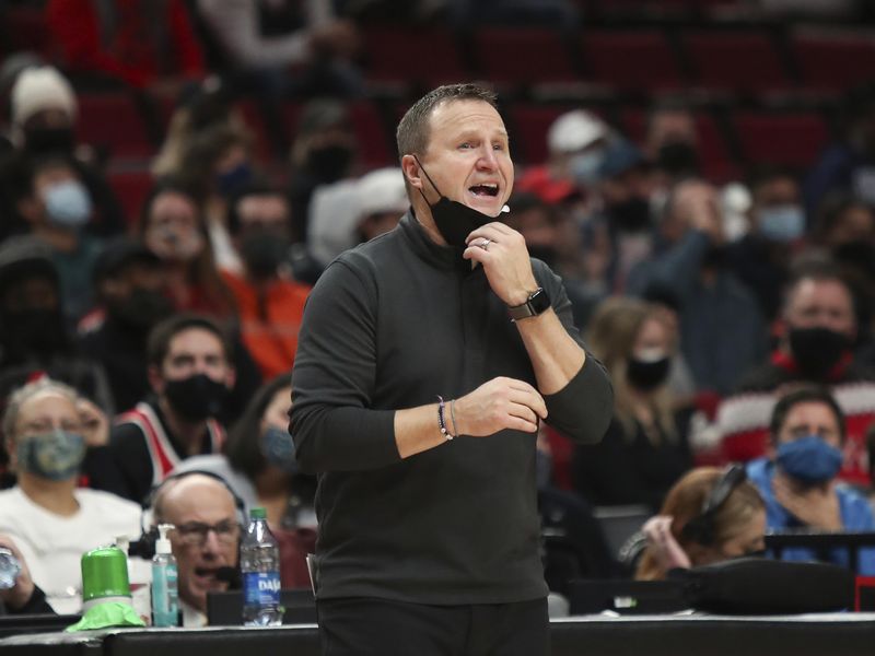 Portland Trail Blazers acting coach Scott Brooks calls out to players