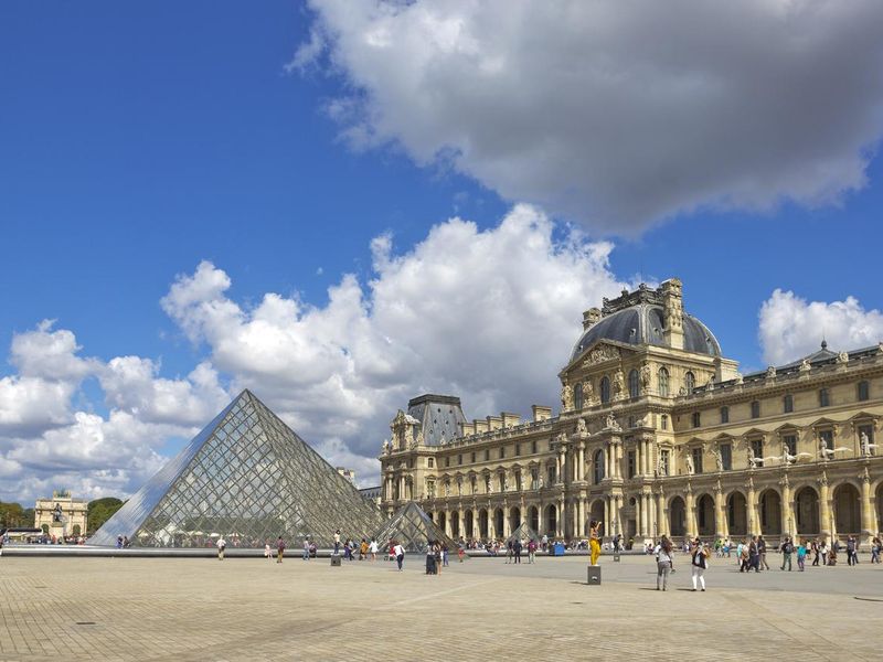 Pyramid at courtyard of Louvre in Paris, France