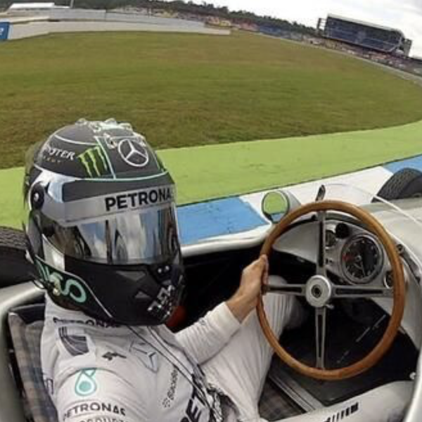 Race car driver taking selfie