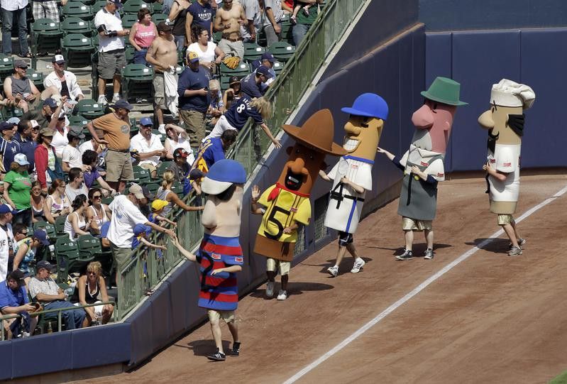 Racing sausages get ready to run during a baseball game