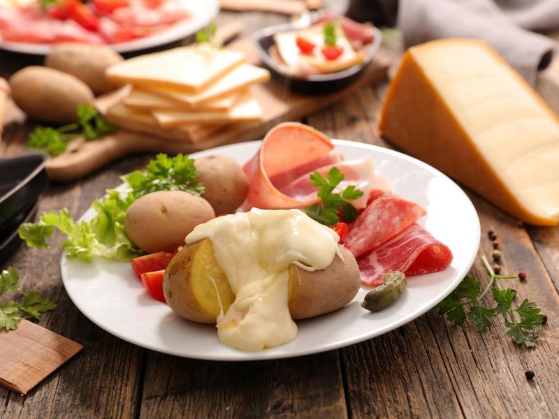 raclette cheese with meat and potato