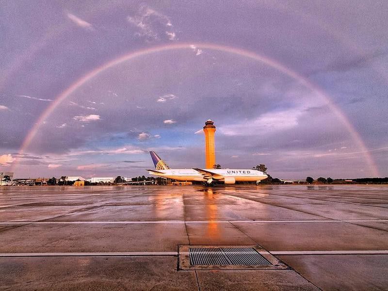 Rainbow over United Airlines aircraft