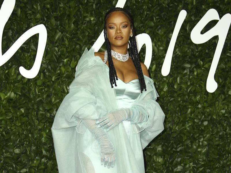 Rihanna poses at Britain Fashion Awards