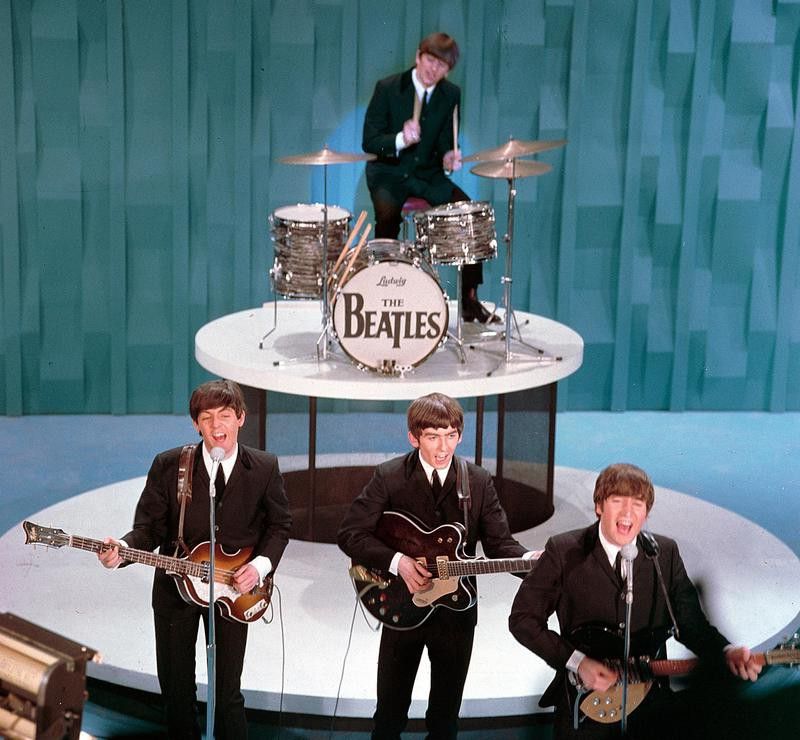 Ringo Starr performing with The Beatles on 'The Ed Sullivan Show in 1964