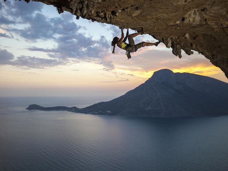 Rock climber at sunset in Kalymnos