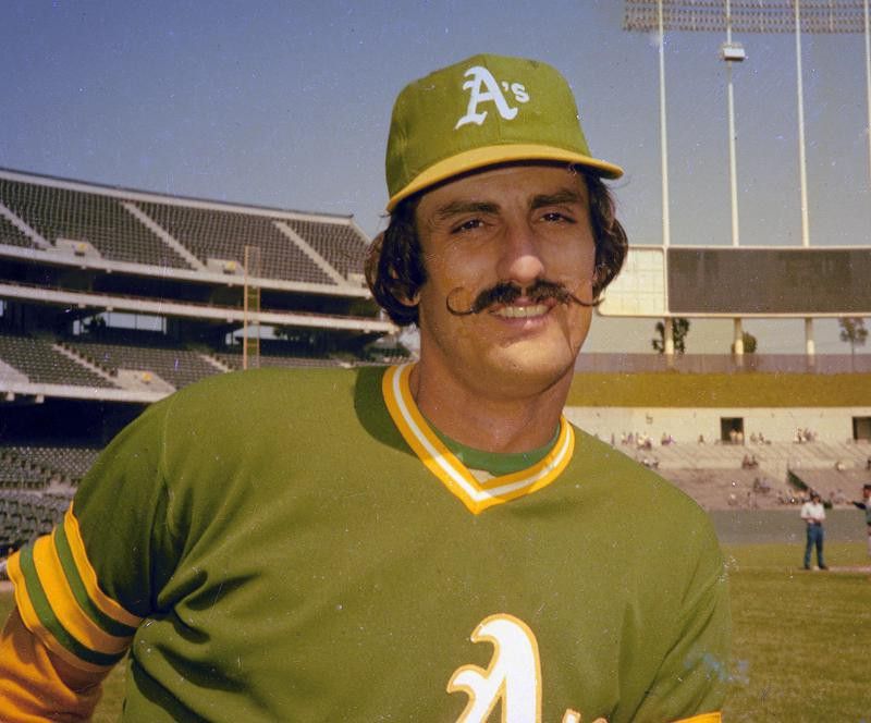 Rollie Fingers poses for photo