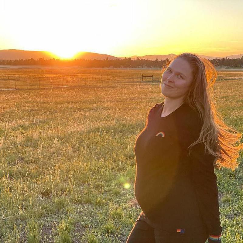 Ronda Rousey posing at sunset