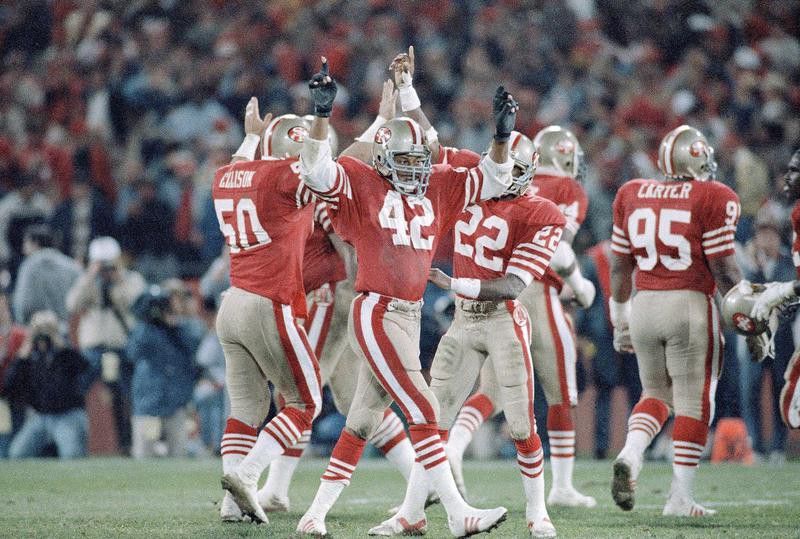 Ronnie Lott and 49ers teammates celebrate