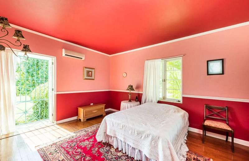 Room with pink and red walls