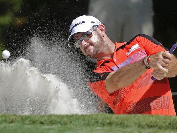 Rory Sabbatini hits out of sand