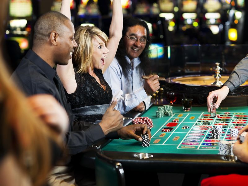 Roulette players in a casino