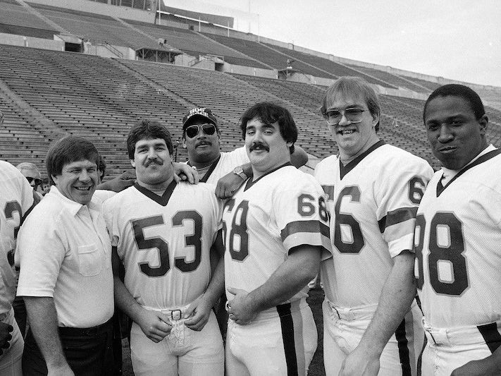 Russ Grimm (No. 68) with other teammates