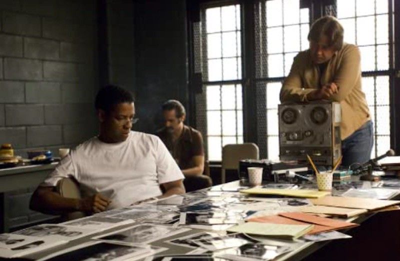 Russell Crowe, Denzel Washington, and Yul Vazquez in American Gangster
