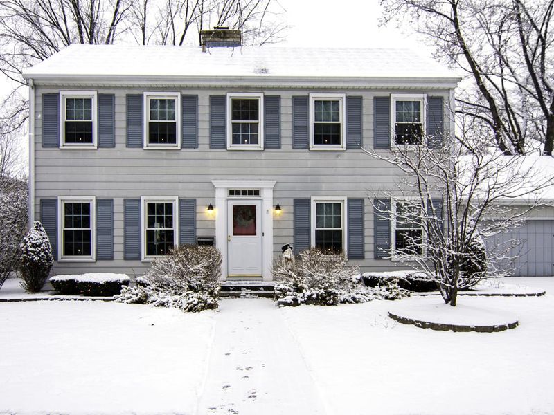 Saltbox Colonial House in Winter