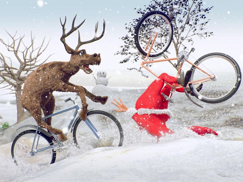 Santa Claus on bicycle with friend reindeer